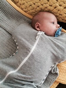Hudson in his Love to Swaddle Up sleep suit